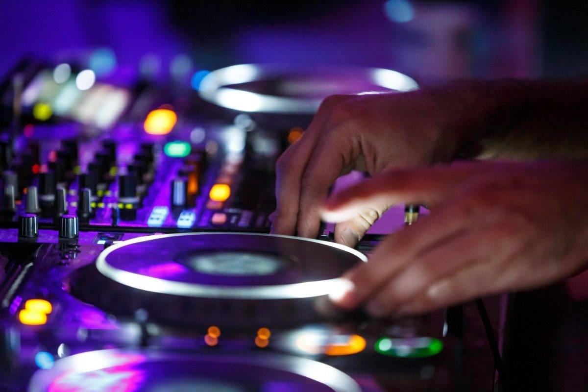 A DJ energizing a private event, delivering personalized music and entertainment to make the celebration unforgettable.